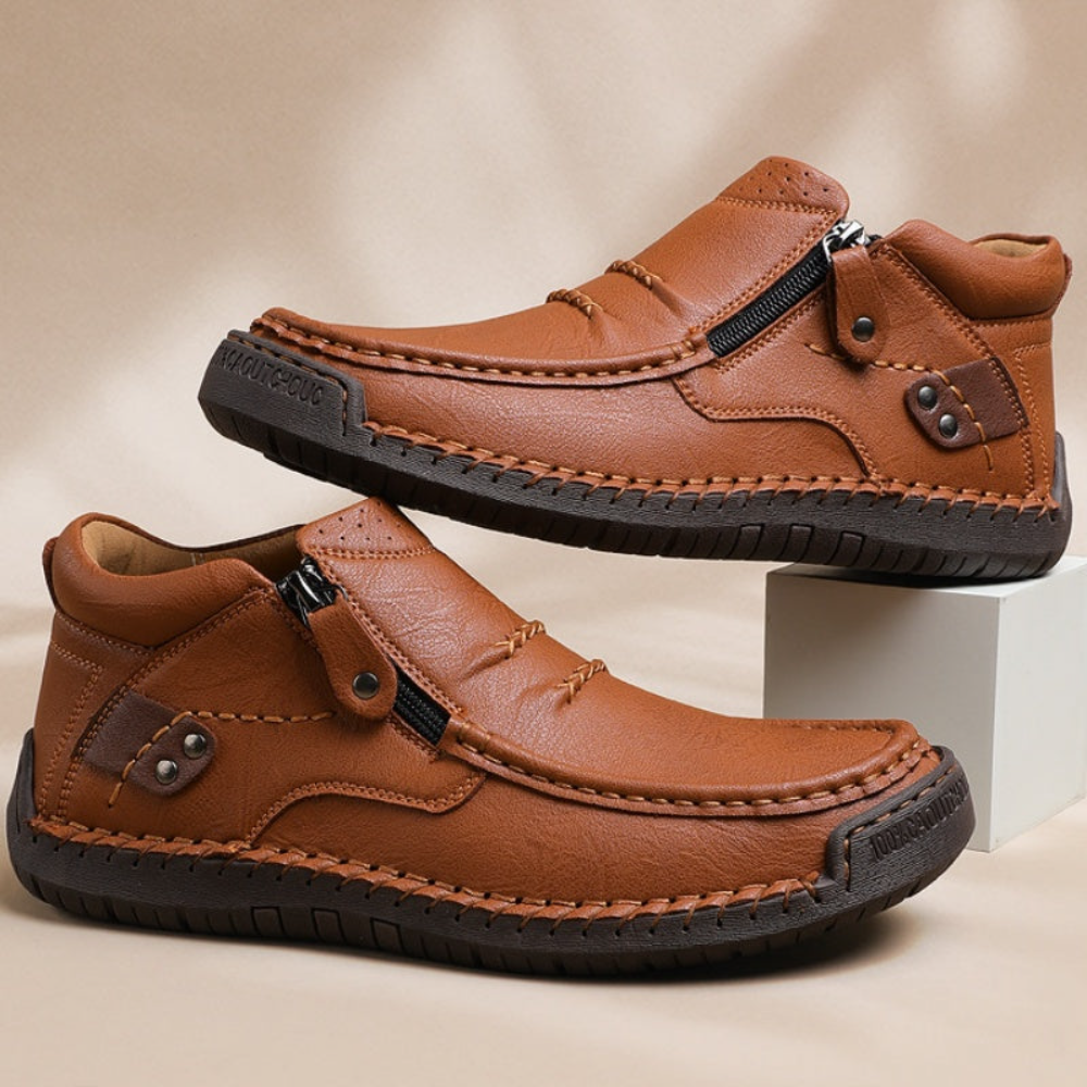 Retro-elegante slip-on herrestøvler i læderstil