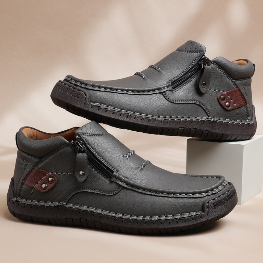 Retro-elegante slip-on herrestøvler i læderstil